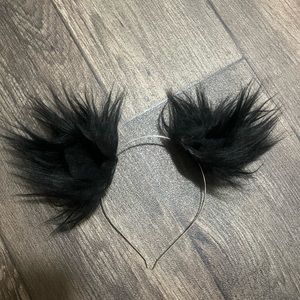 Black clip in animal ears